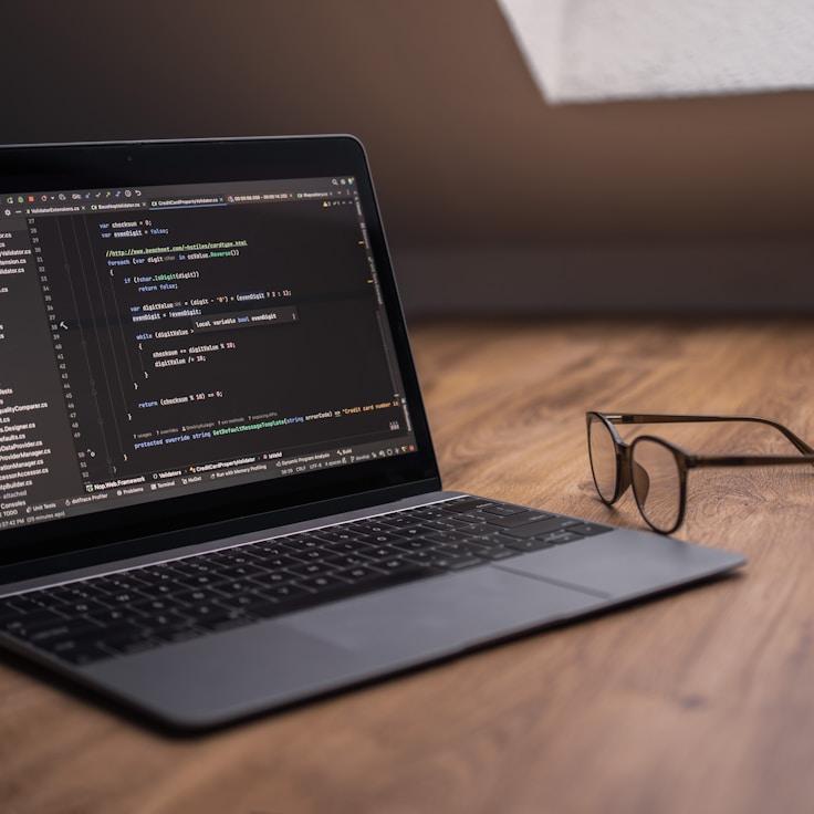 Mobile app project planning workspace with devices and development tools